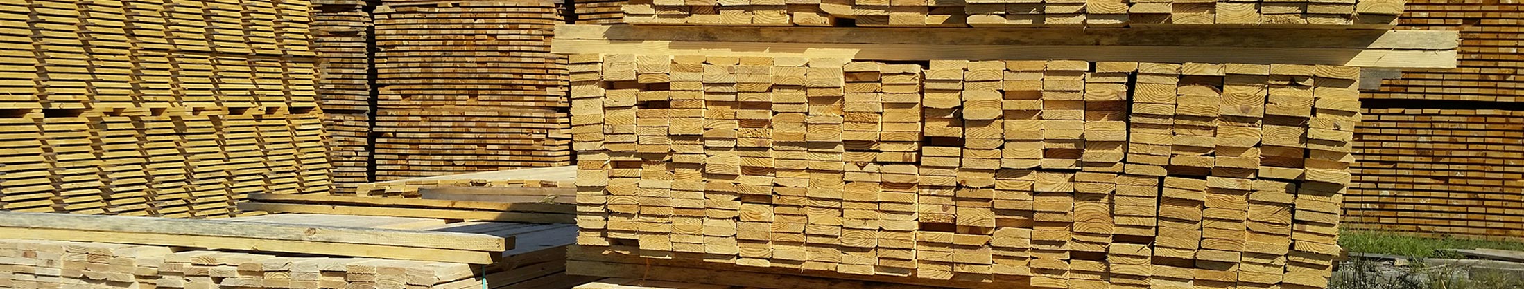 Packs of milled softwood in the yard