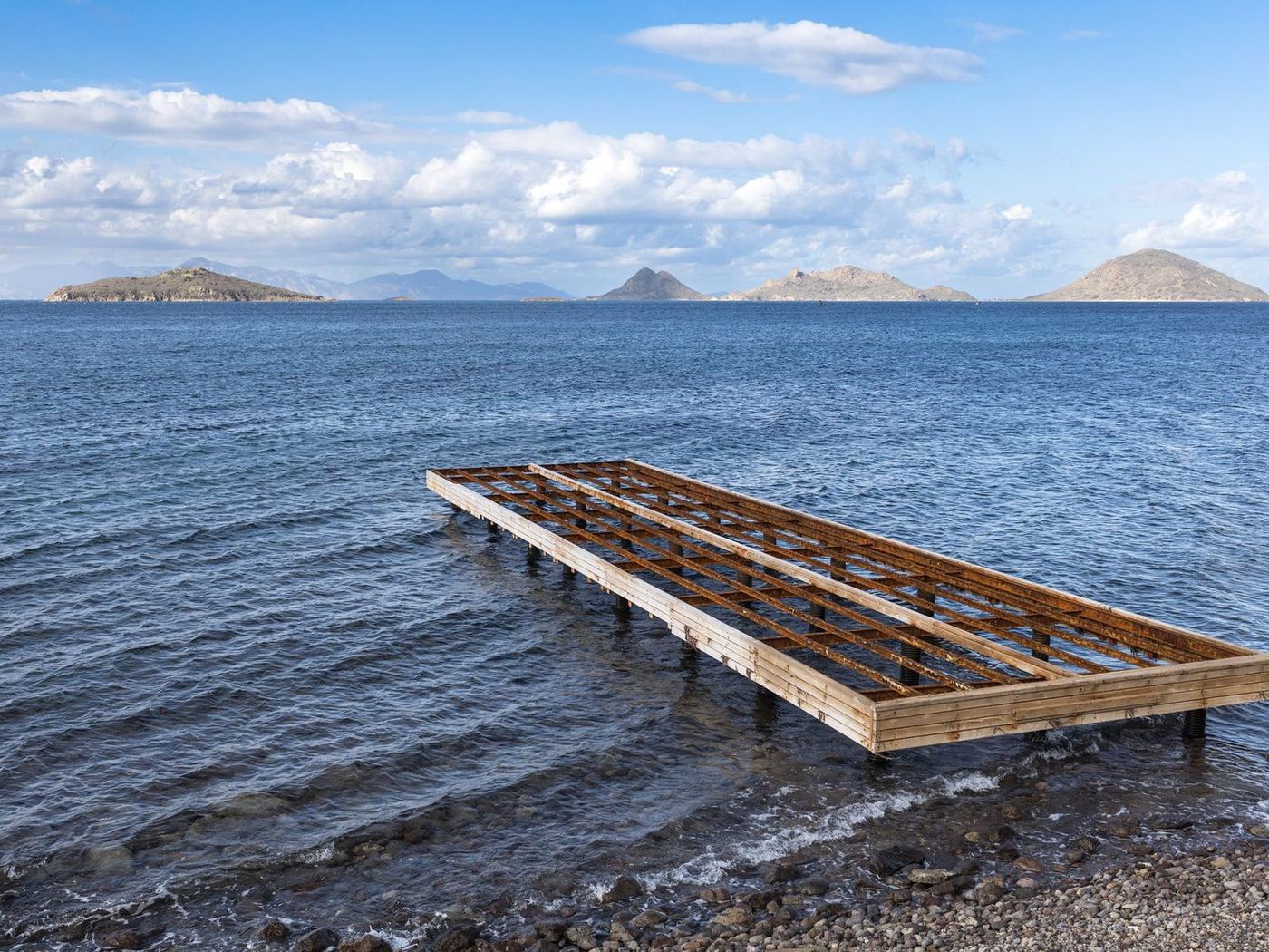 New timber dock frame set on the shallows, waiting for its decking